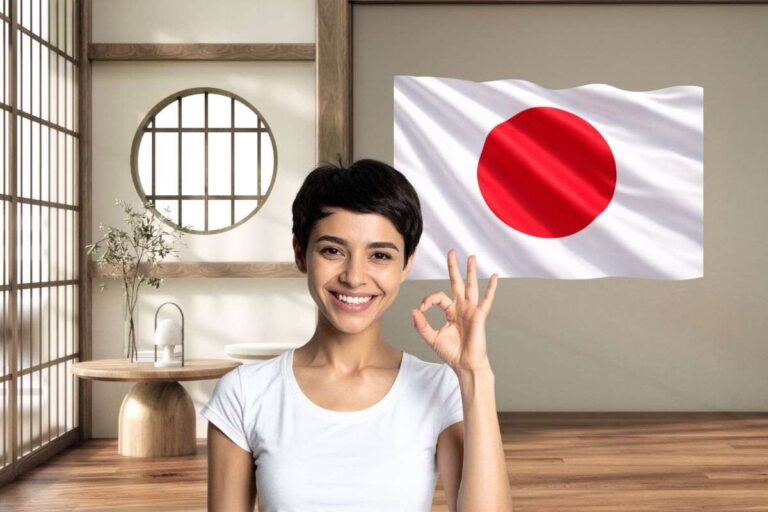 bandiera giapponese in un salotto vuoto e donna in primo piano che fa ok